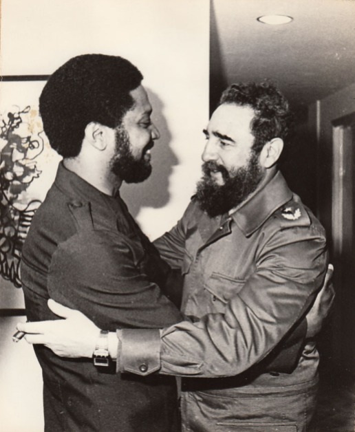Maurice Bishop being embraced by Fidel Castro